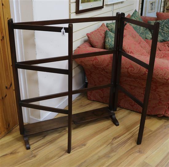 A mahogany 19th century clothes stand with folding panels W.183cm